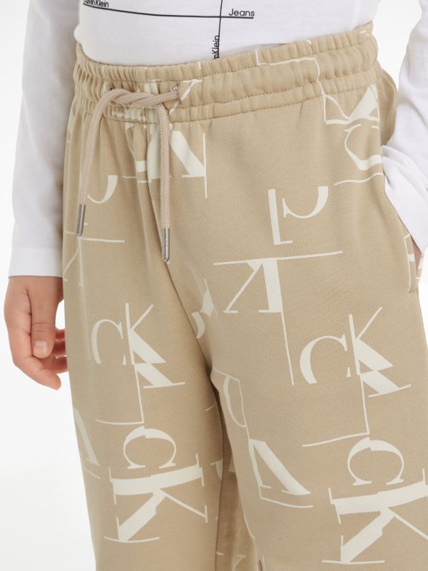 Calvin Klein Boys City Grid AOP Joggers in Beige Fashion