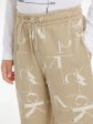 Calvin Klein Boys City Grid AOP Joggers in Beige Fashion