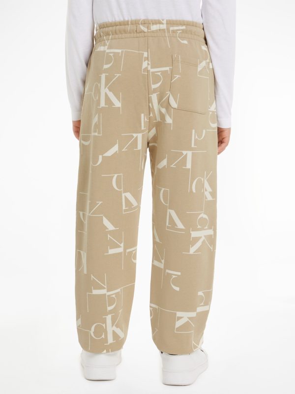 Calvin Klein Boys City Grid AOP Joggers in Beige Fashion